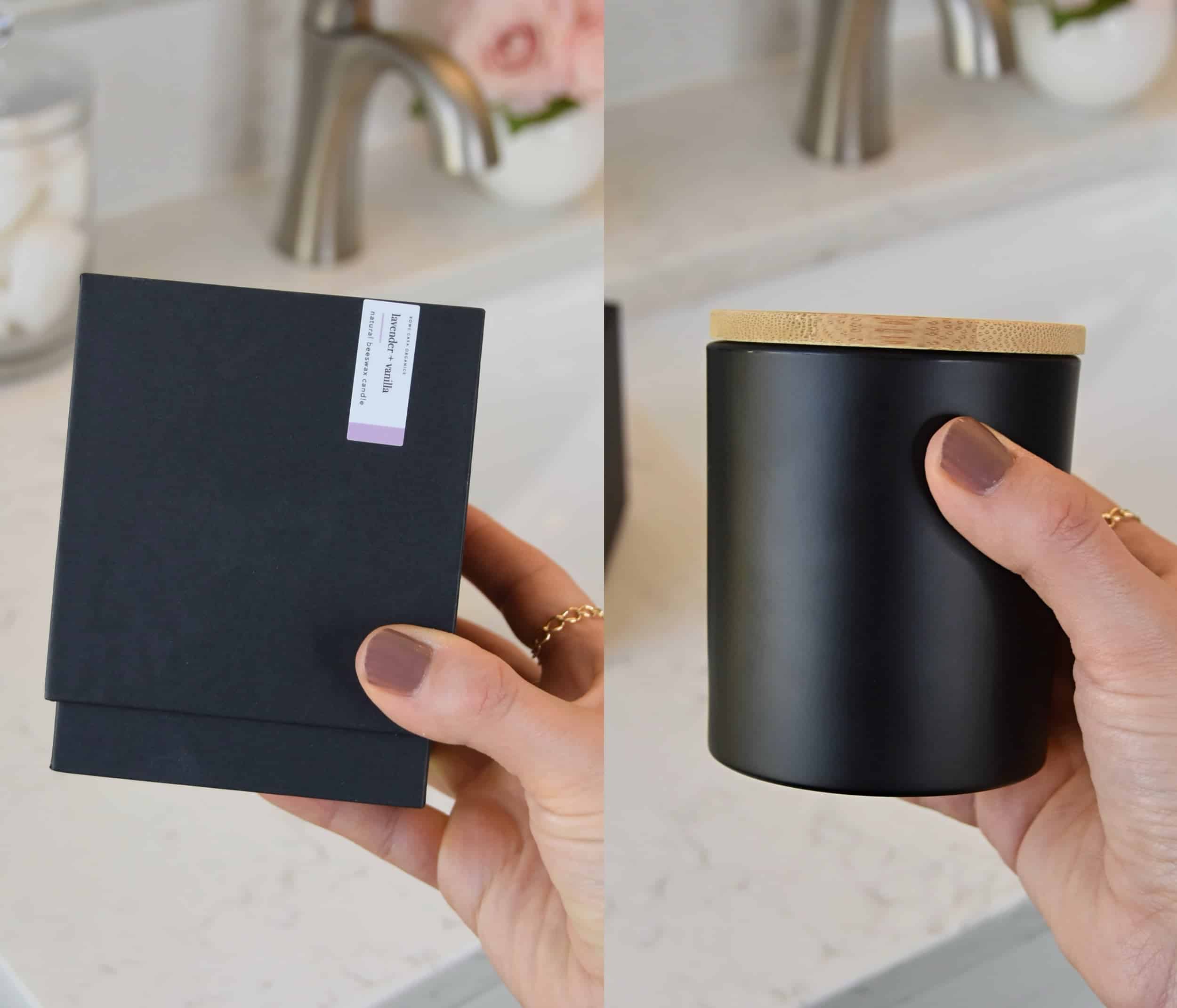 Holding the candle box, and the actual candle to compare what it looks like side by side.